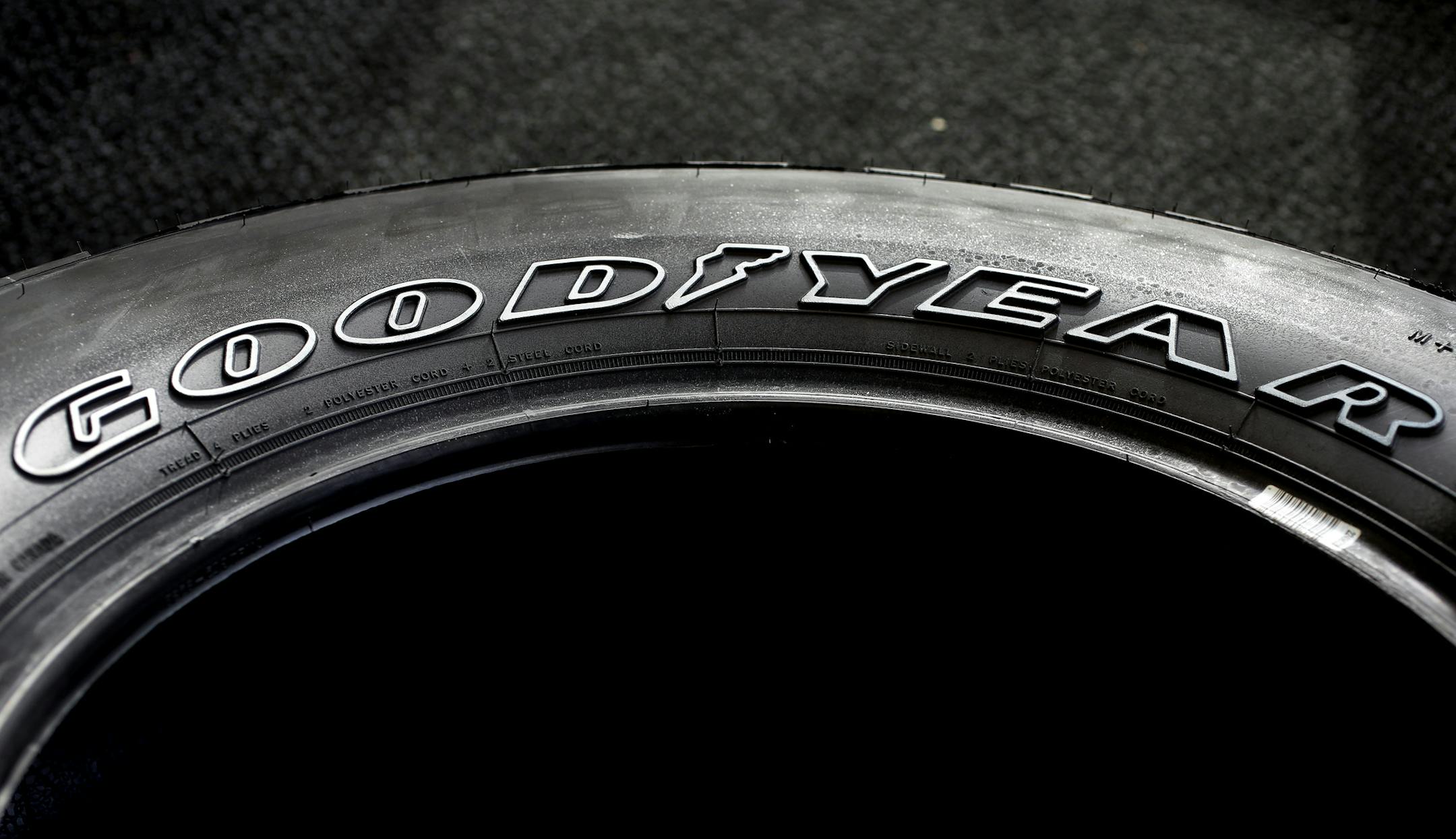 In this Nov. 30, 2017 photo the Goodyear brand name is molded into the sidewall of a tire at a Goodyear Auto Service Center, in Stoneham, Mass. Goodyear Tire reports earnings Thursday, Feb. 8, 2018. (AP Photo/Steven Senne) ORG XMIT: NYJK301
