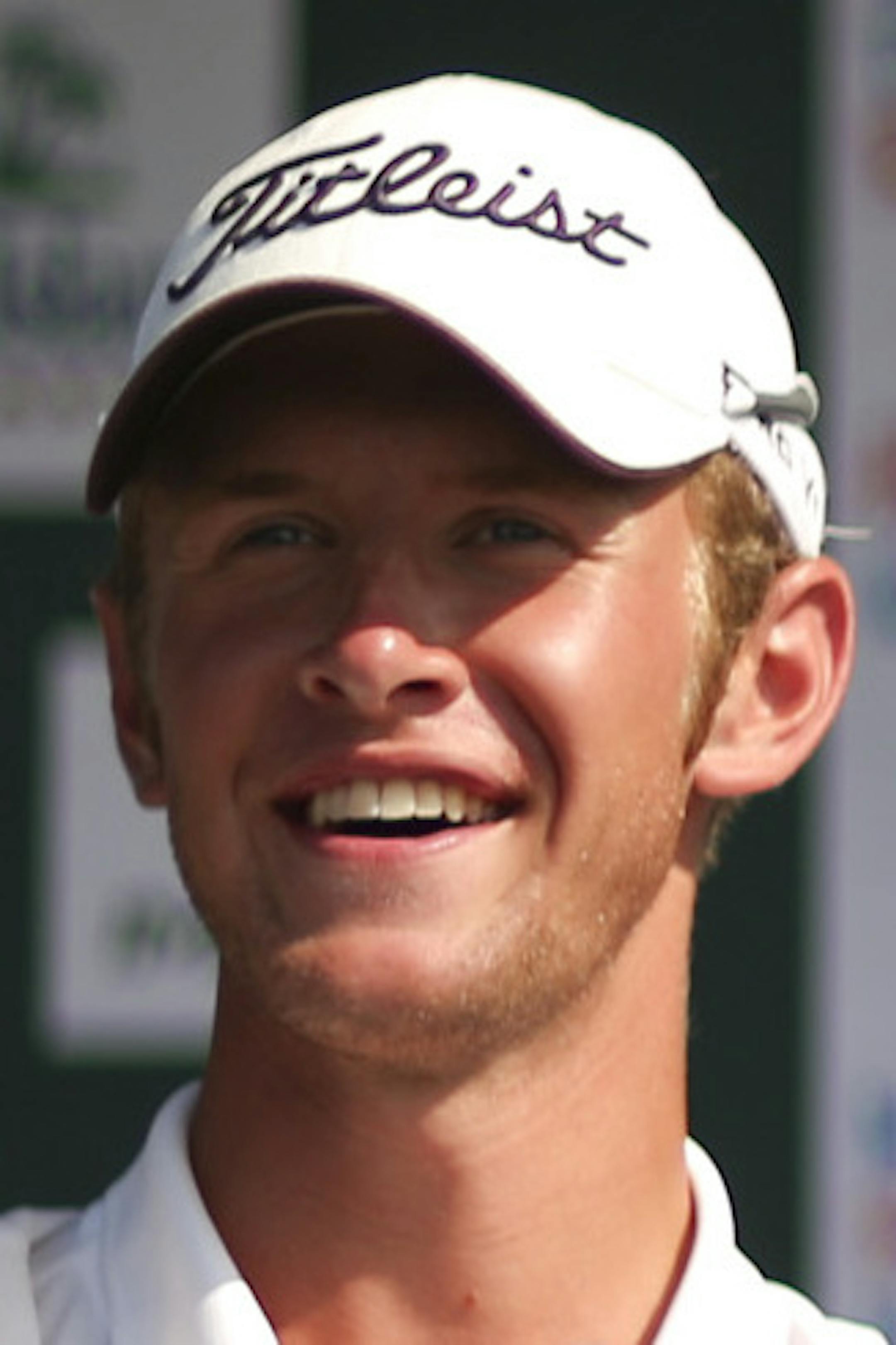The Minnesota State Open Championship ended with a three way tie after 54 holes of golf at Edinburgh USA Golf Club in Brooklyn Park, Minn. Sunday afternoon, July 21, 2013. Jon DuToit birdied the first playoff hole to win the tournament. Amateur Jon DuToit held up the crystal trophy that was his for sunk winning the Minnesota State Open Sunday afternoon. ] JEFF WHEELER &#x201a;&#xc4;&#xa2; jeff.wheeler@startribune.com