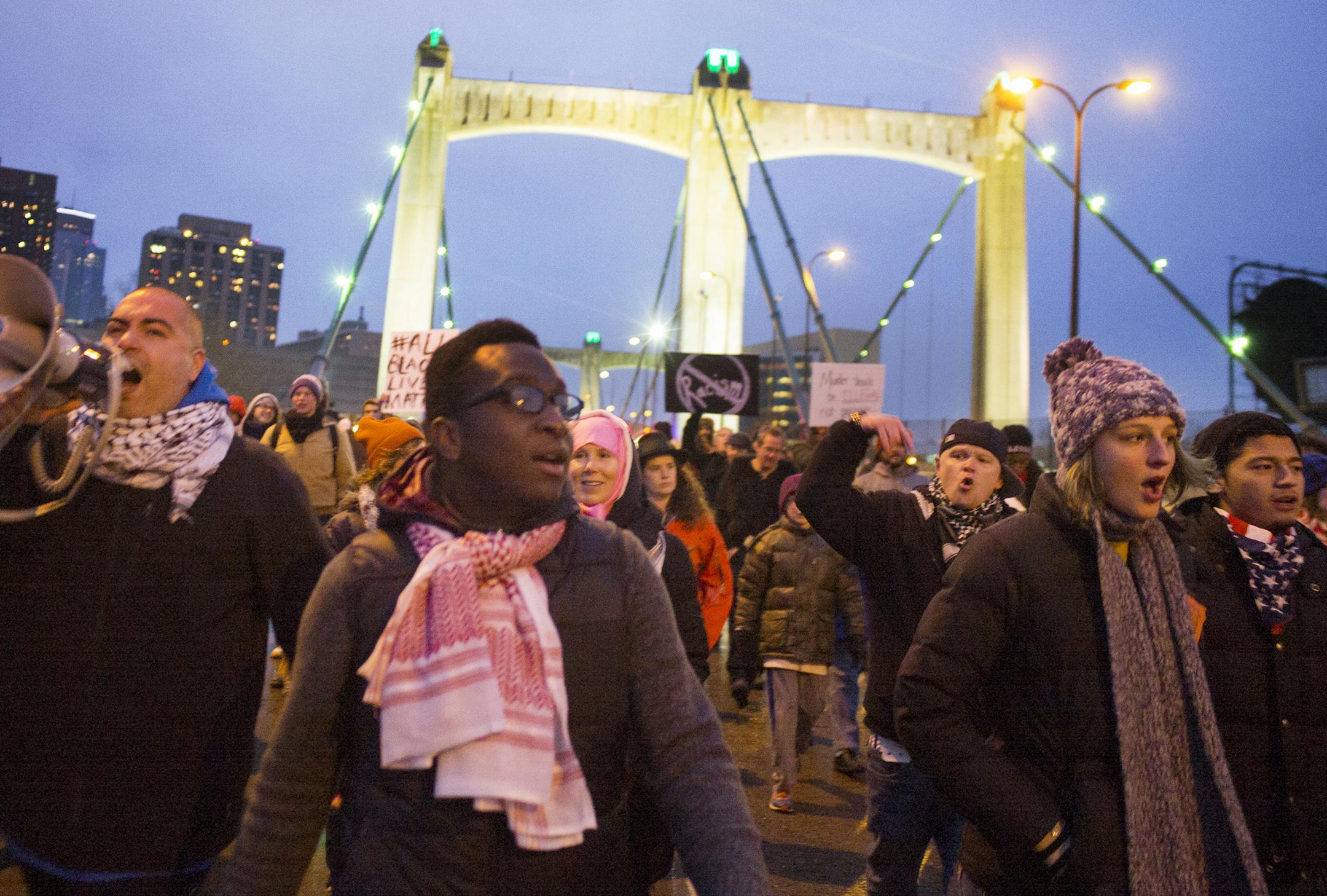 Activist Sabra Wazwaz led protesters across the Hennepin Bridge.]In downtown Minneapolis, about 150 people turned out to protest police brutality. They marched from the Central Library across the Hennepin Bridge and back to the library across the 3rd Ave Bridge while staging a "die in" at Hennepin County Government Plaza .]Richard Tsong-Taatarii/ rtsong- taatarii@startribune.com