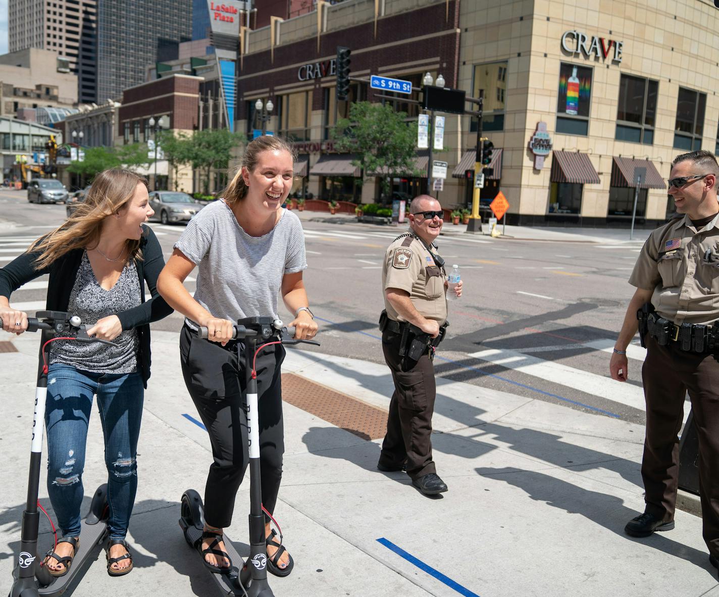 Sophie Konewko and Megan Albers decided to take two Bird scooters for a ride through downtown Minneapolis after lunch. They joked with two Hennepin County Sheriff's deputies at 9th and Hennepin. ] GLEN STUBBE &#xef; glen.stubbe@startribune.com Tuesday, July 10, 2018 Minneapolis council takes up regulation of scooters, on the same morning Bird strategically placed the scooters around downtown. What do people think of the newest ride share? (intern Chris Bowling, 513-907-3988) What's Happening at