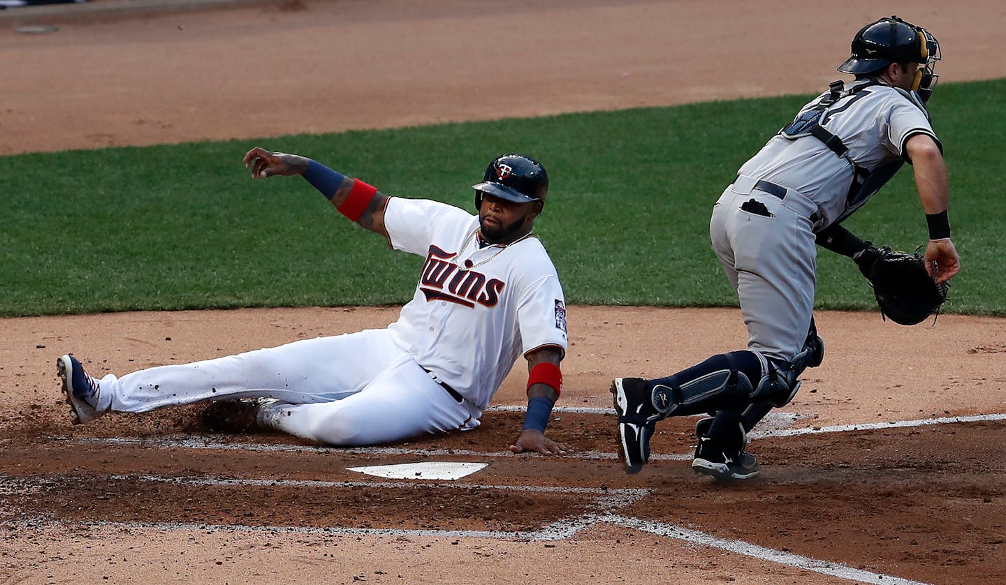 Kennys Vargas slid into home with the Twins' first run on an Eddie Rosario double in the second inning. ] CARLOS GONZALEZ � cgonzalez@startribune.com - July 17, 2017, Minneapolis, MN, Target Field, MLB, Minnesota Twins vs. New York Yankees