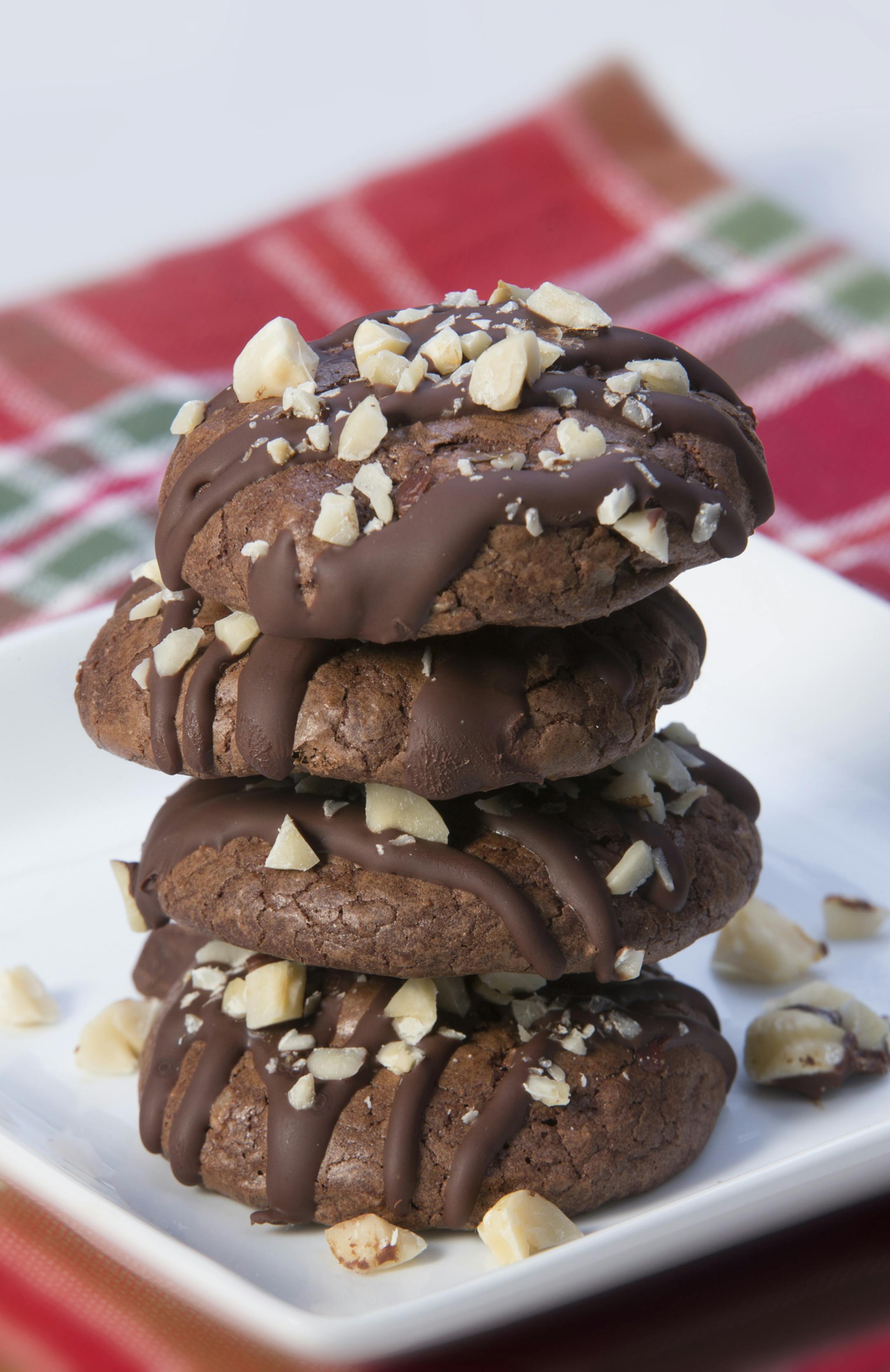 Caption for cookies: The 2014 Taste holiday cookie contest winners include: Italian Almond Cookies, Tart & Sassy Cranberry Lemon Drops; Chocolate Thumbprints; Macadamia Nut Tarts and Espresso-Hazelnut Truffle Cookies. The annual Star Tribune cooky contest