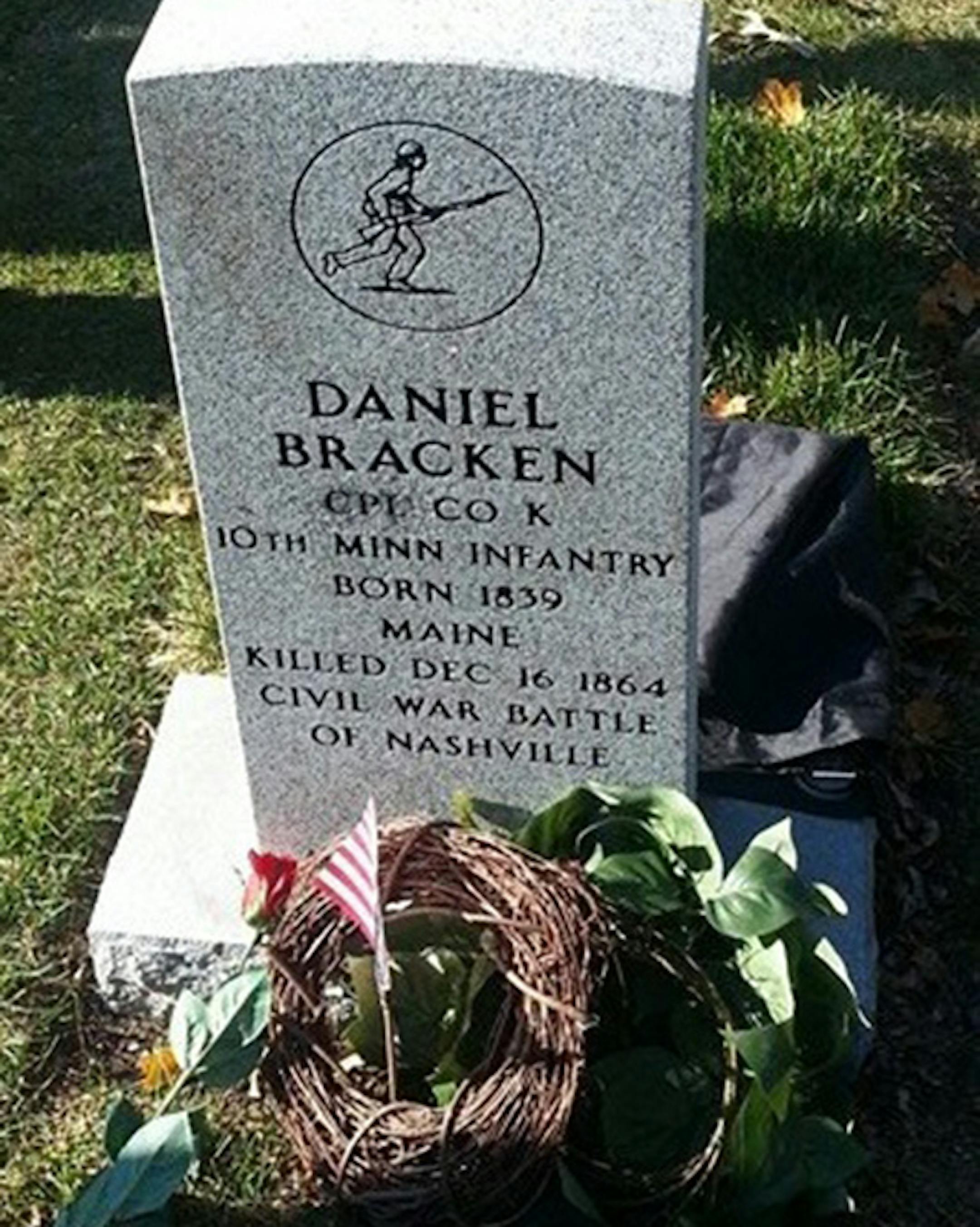 Caption: Cpl. Daniel Brackenís new headstone at St. Anthony Cemetery in northeast Minneapolis. - NOTE SMALL FILE SIZE ORG XMIT: kiTy5U3FMYbbuu83kXnc