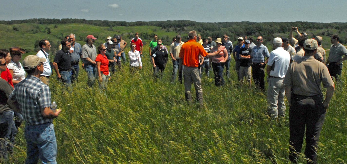 About 70 natural resources professionals who will be part of Minnesota's effort to conserve the state's remaining native prairies and restore grasslands on Tuesday toured a vast Kandiyohi County project undertaken by the U.S. Fish and Wildlife Service and a cooperating landowner.