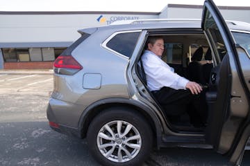 Elam Baer takes an Uber home from work at the Corporate Technologies Building in Eden Prairie on Friday. His newly formed rideshare firm, MyWeels, is 