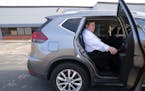 Elam Baer takes an Uber home from work at the Corporate Technologies Building in Eden Prairie on Friday. His newly formed rideshare firm, MyWeels, is 