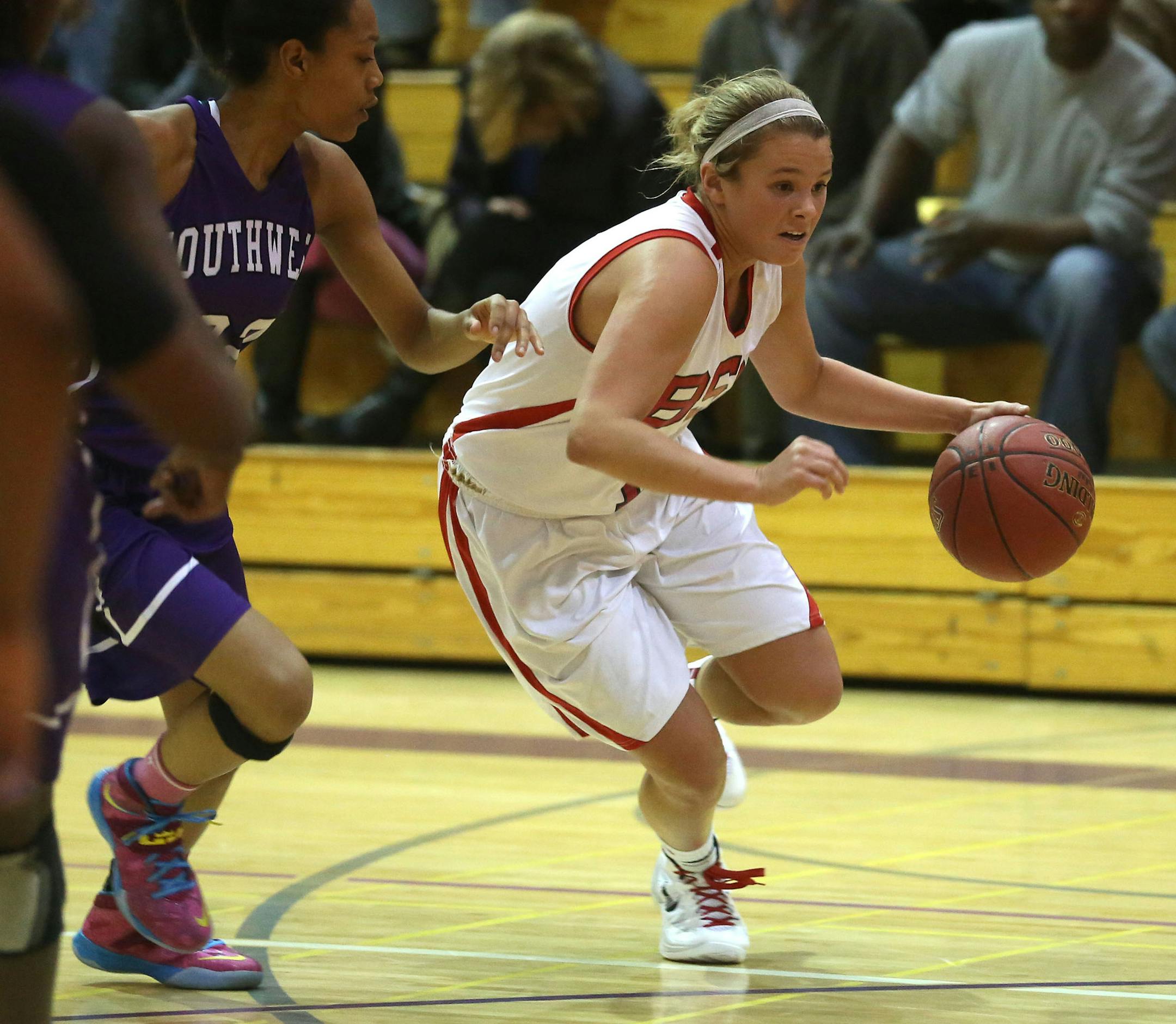 Grace Coughlin, of Benilde-St. Margaret, drove to the basket against the Southwest defense in Minneapolis Friday, December 6, 2013. ] (KYNDELL HARKNESS/STAR TRIBUNE) kyndell.harkness@startribune.com