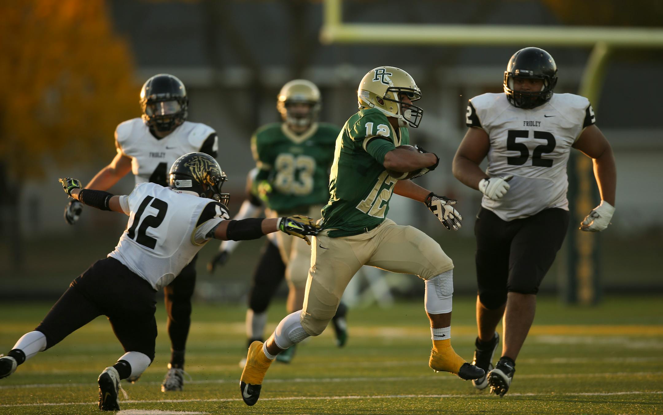 Park Center's Amani Hooker broke a tackle by Fridley's Jonathan Arzola while running 73 yards for a second quarter touchdown on a fake punt last season.