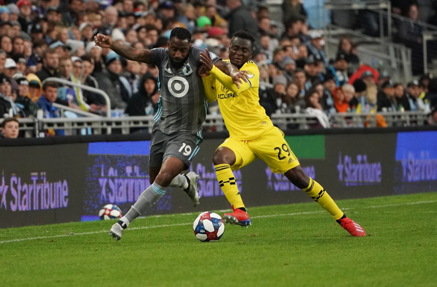 Minnesota United defender Romain Metanire (19) battled Columbus Crew's David Accam (29) in the first half of a game on May 18. The Loons' All-Star Game representative, away on international team competition, has not played with United since June 2.