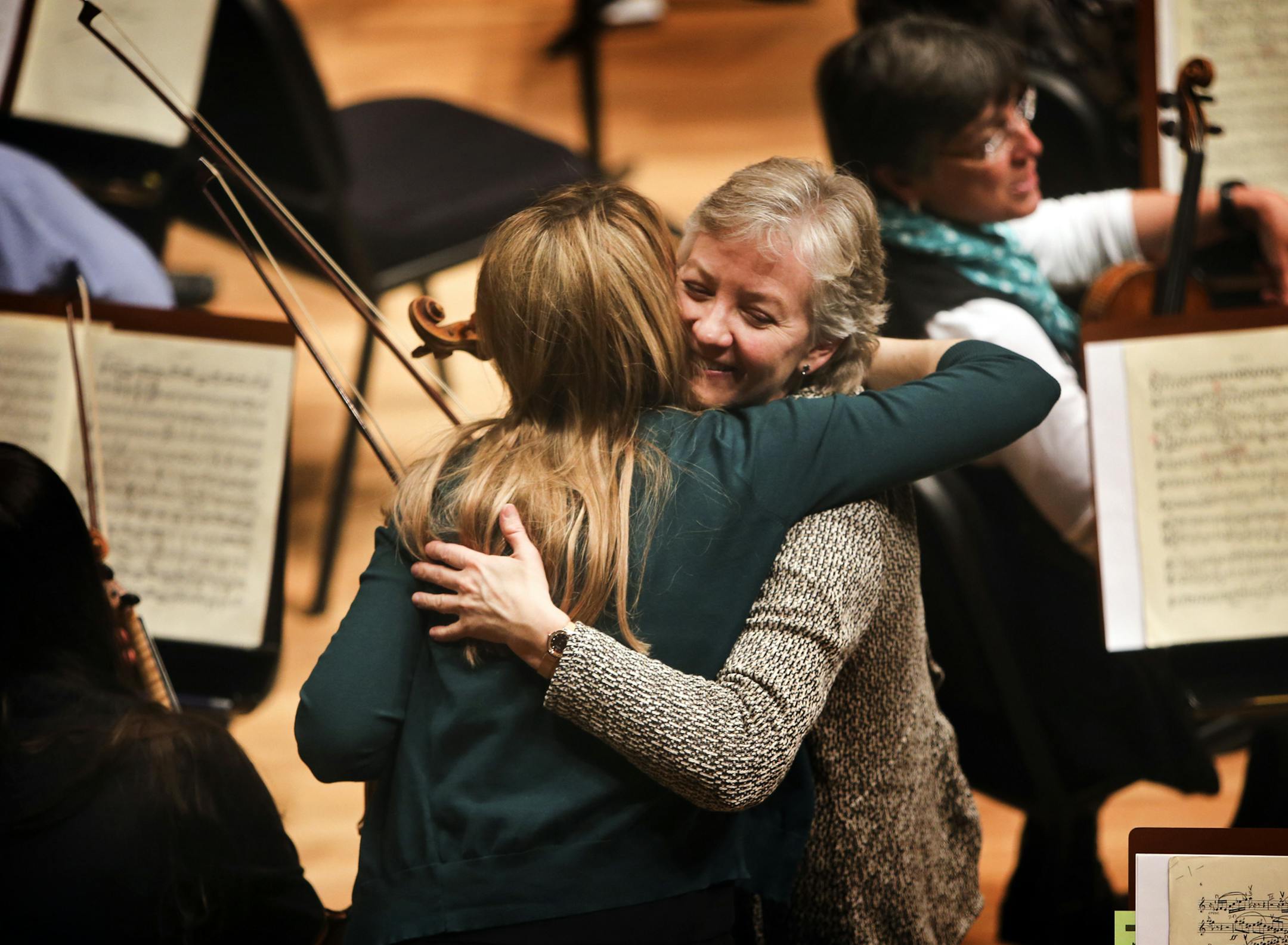 It was hugs all around as the musicians rehearsed at Orchestra Hall for the first time since June 2012.