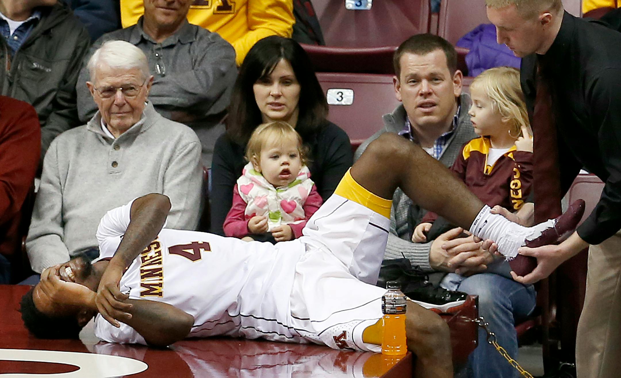Gophers freshman Kevin Dorsey was attended to by a trainer in the first half against Chicago State on Wednesday. He has a bruised heel and will have an MRI on Thursday.