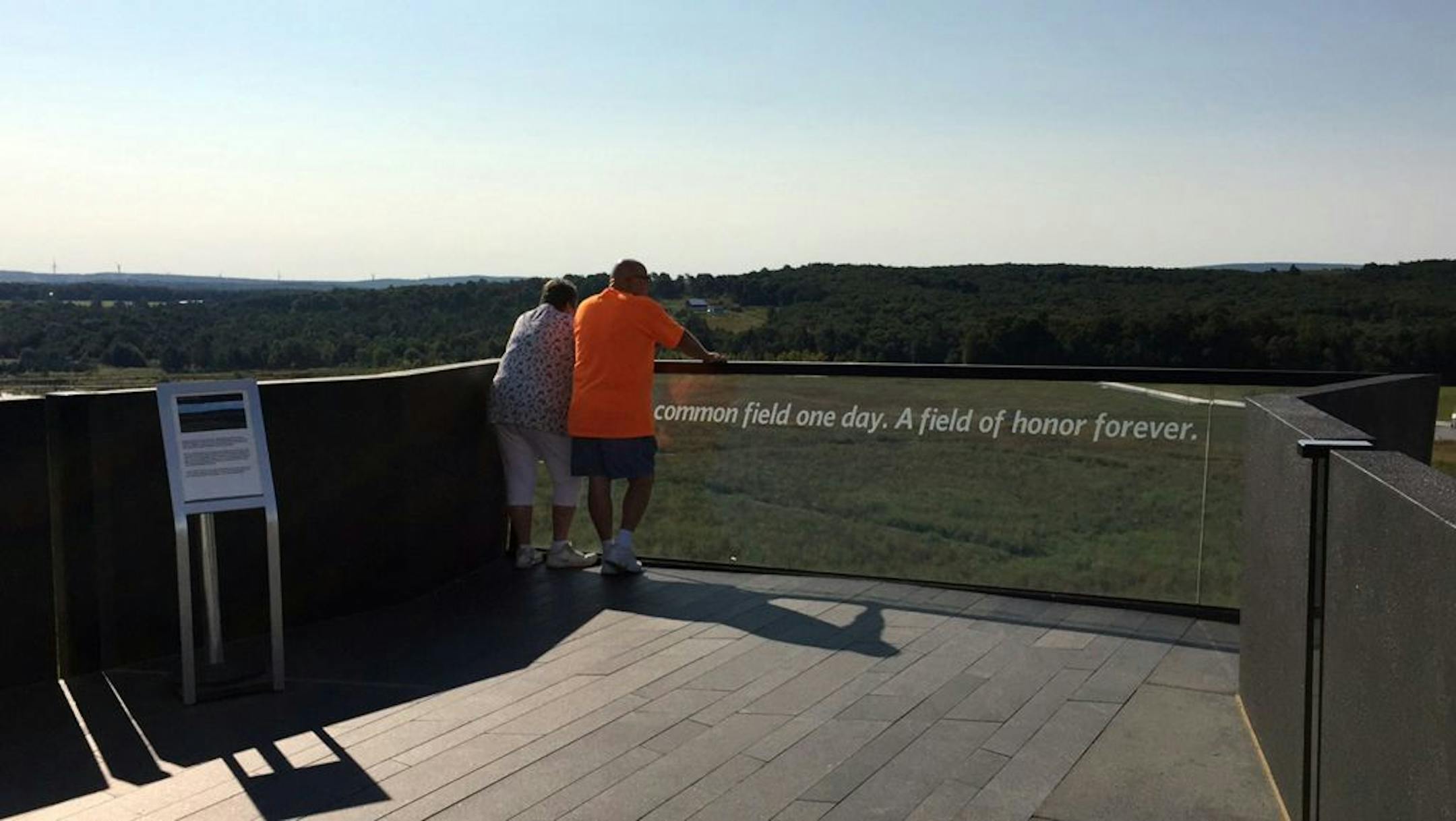 April and Elvin Lottig, of Cleveland, gaze at the crash site of Flight 93 during a to the National Park Service memorial outside Shanksville, Somerset County, Pa., on September 5, 2016.