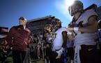 Minnesota Gophers head coach PJ Fleck lined up with his players before taking the field before Wednesday's game against the Auburn Tigers. ] Aaron Lav