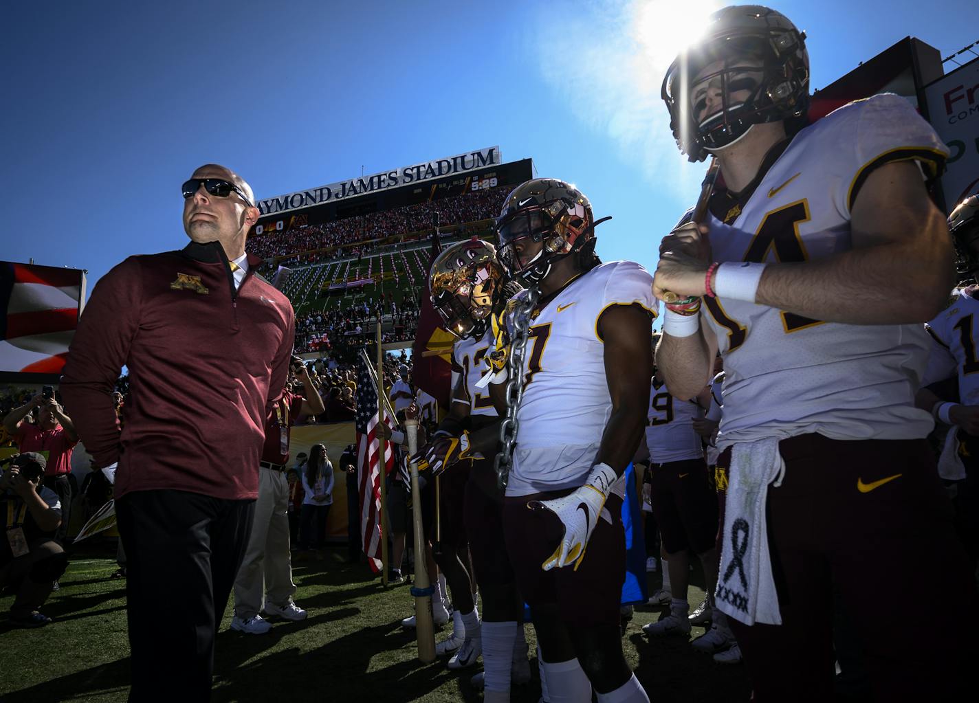 Minnesota Gophers head coach PJ Fleck lined up with his players before taking the field before Wednesday's game against the Auburn Tigers. ] Aaron Lavinsky &#x2022; aaron.lavinsky@startribune.com The Minnesota Gophers played the Auburn Tigers in the Outback Bowl on Wednesday, Jan. 1, 2020 at Raymond James Stadium in Tampa, Fla. ORG XMIT: MIN2001021752530292