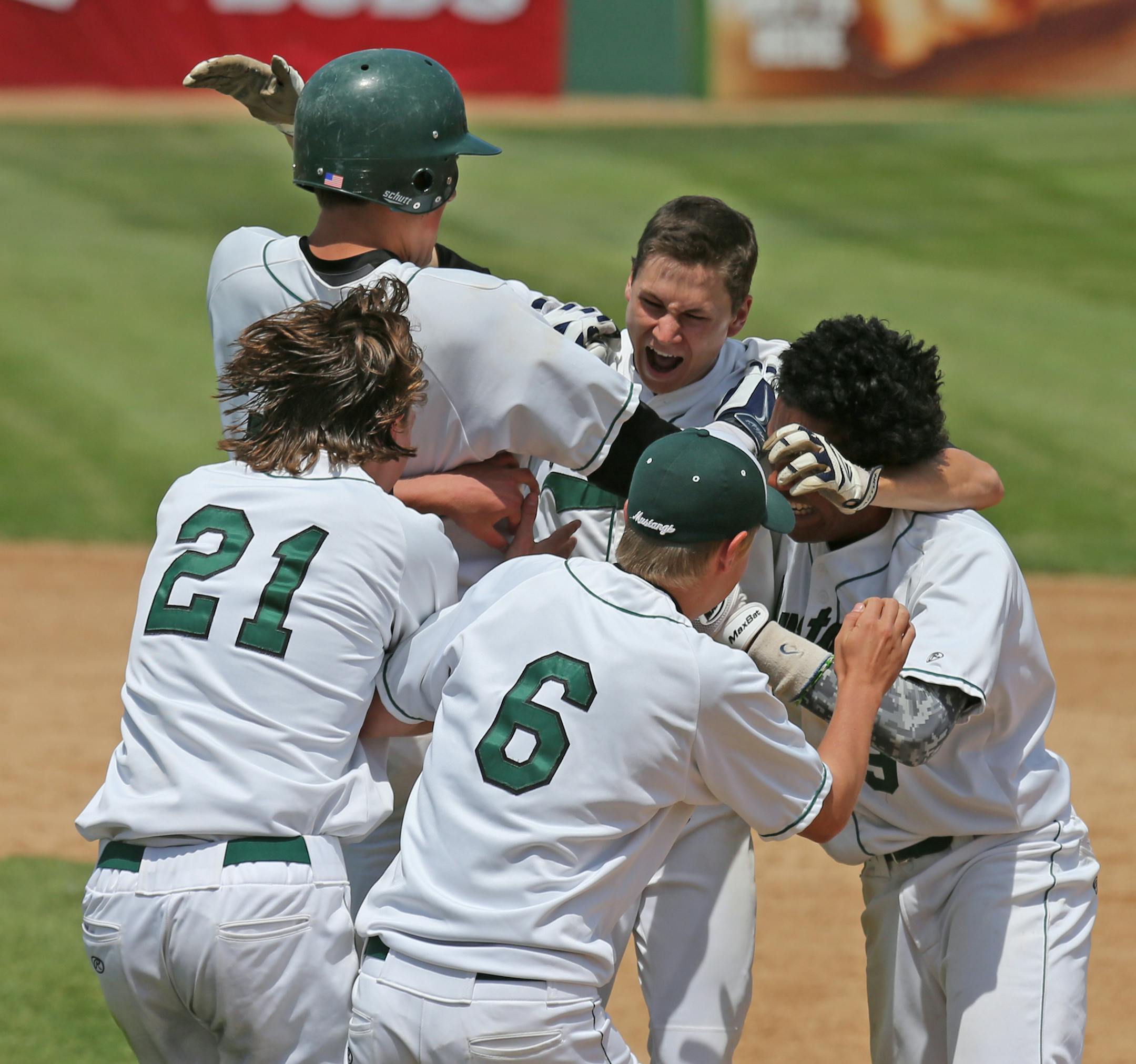 Mounds View celebrated their win over Lakeville North.] Class 3A semifinals, Boys State Baseball Tournament, Midway Stadium, ST. Paul, MN., 6/13/14. Bruce Bisping/Star Tribune bbisping@startribune.com
