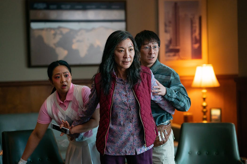 Stephanie Hsu, Michelle Yeoh and Ke Huy Quan in “Everything Everywhere All At Once.”