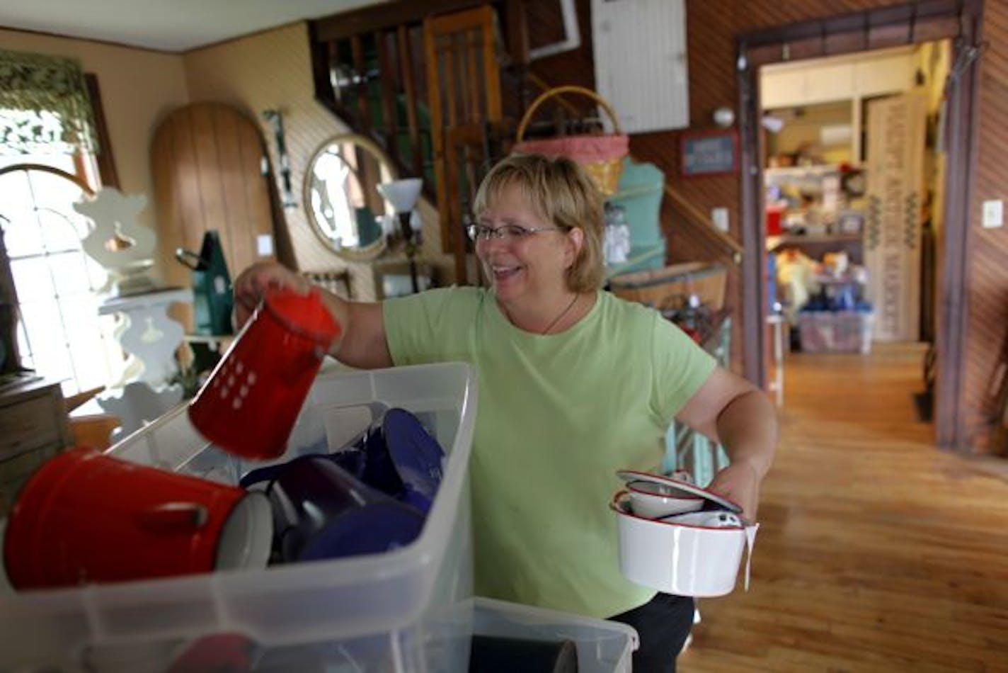 Deb Haupt owner of Haupt Antiek Market packed up items in her old store in Rosemount, Haupt will be moving to a new place in Apple Valley.