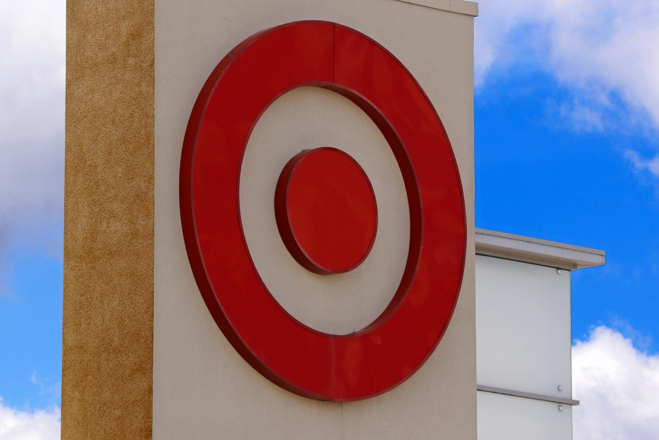This May 3, 2017, photo shows the Target logo on a store in Upper Saint Clair, Pa. Target is jumping into voice-activated shopping as it deepens its relationship with Google, offering thousands of items found in the store except for perishables like fruit and milk. The move is happening as Google says shopping will be available later in 2017 through Google Assistant on iPhone and Android phones, joining its Google Home device and Android TV. (AP Photo/Gene J. Puskar)