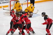 Ohio State’s Sophie Jaques (18) and teammates celebrated her overtime goal against the Gophers in the WCHA championship game March 6 at Ridder Arena
