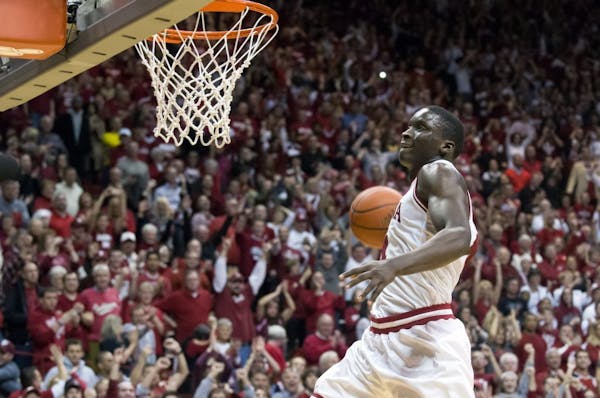 Indiana's Victor Oladipo (4) drives toward the basket for a slam dunk during the second half of an NCAA college basketball game Saturday, Feb. 2, 2013