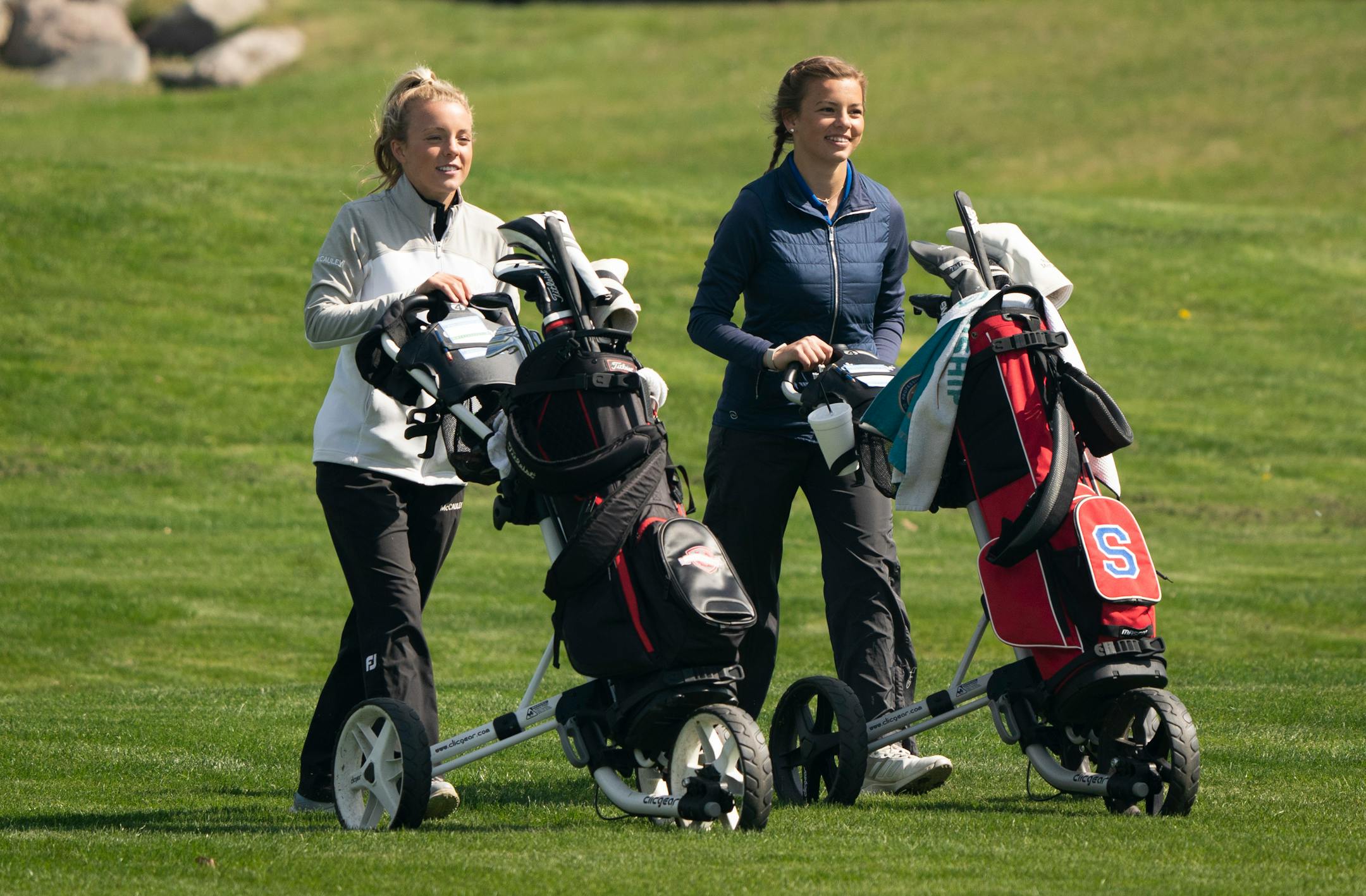 Isabella McCauley, a Simley High School junior who recently qualified for the women's U.S. Open, walked to her ball with her sister Reese McCauley during a meet at Rich Valley Golf Club in Rosemount, Minn., on Thursday, May 6, 2021. She made the 25 foot put. ] RENEE JONES SCHNEIDER ¥ renee.jones@startribune.com