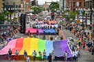 The Rainbow flag, Bi flag, Trans flag and Leather flag at the start of the Pride parade down Hennepin Ave, Minneapolis. ] GLEN STUBBE &#xa5; glen.stub