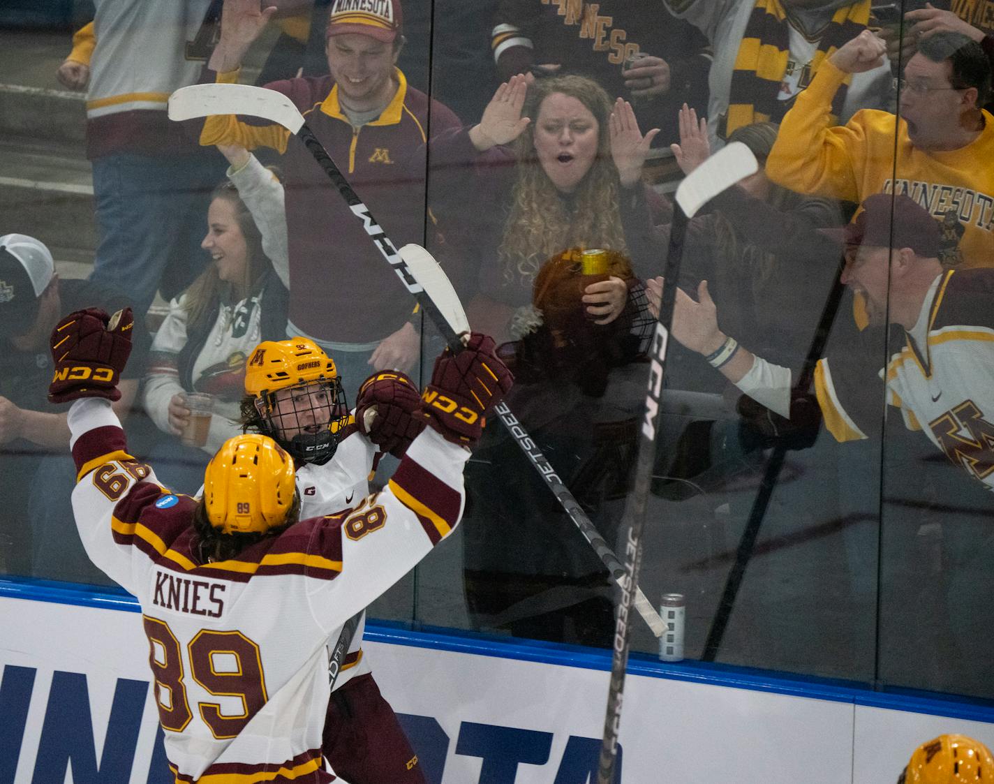 Minnesota Gophers forward Logan Cooley (92) celebrated his go ahead goal in the second period. The University of Minnesota Gophers faced the St. Cloud State Huskies in an NCAA Division I Men's Ice Hockey Championship second round game Saturday night, March 25, 2023 at Scheels Arena in Fargo, North Dakota. ] JEFF WHEELER • jeff.wheeler@startribune.com