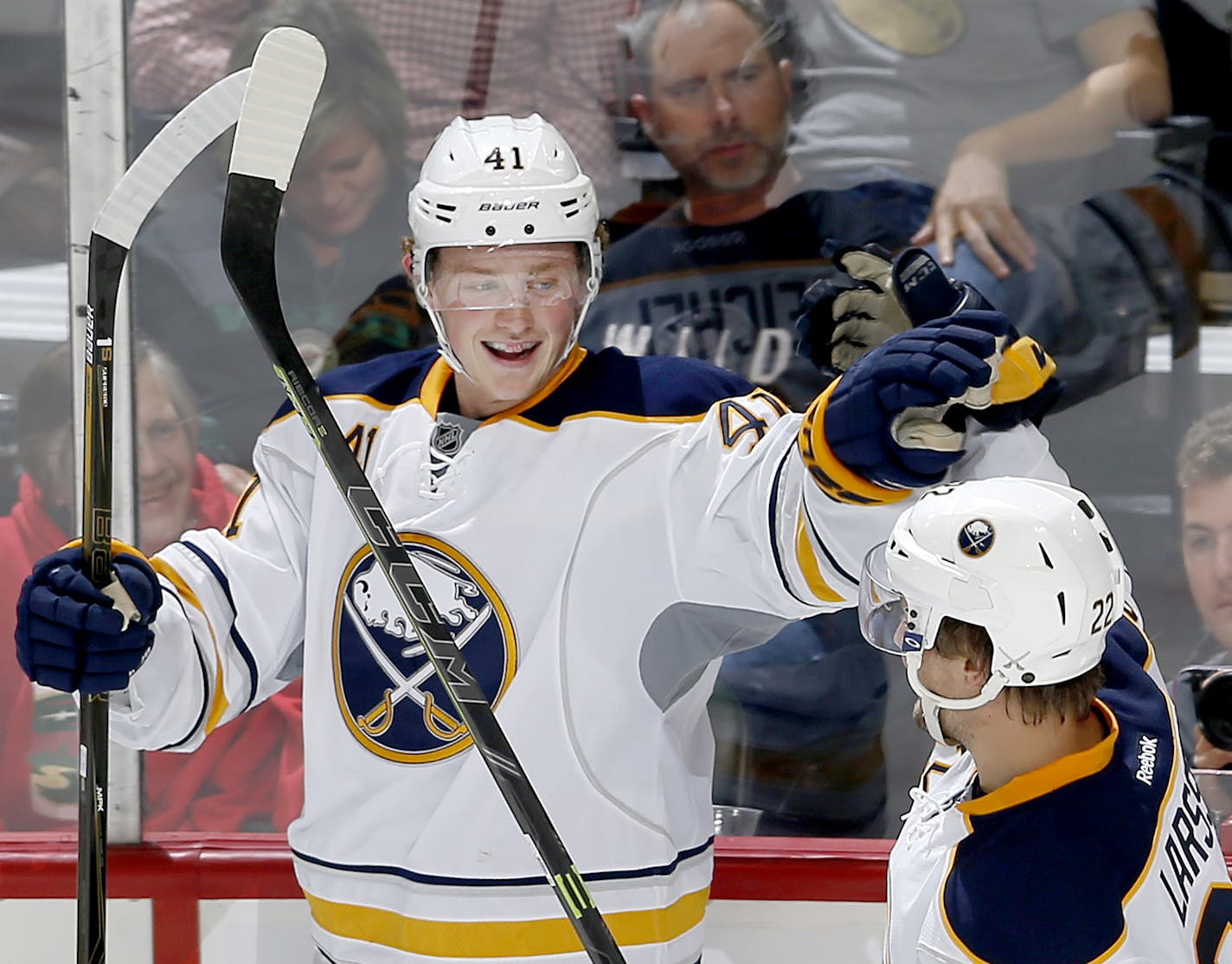 Jack Eichel (41) of the Buffalo Sabres celebrated with teammate Johan Larsson (22) after scoring a shorthanded goal in the third period. ] CARLOS GONZALEZ &#xef; cgonzalez@startribune.com - September 21, 2015, St. Paul, MN, Xcel Energy Center, NHL, Minnesota Wild vs. Buffalo Sabres