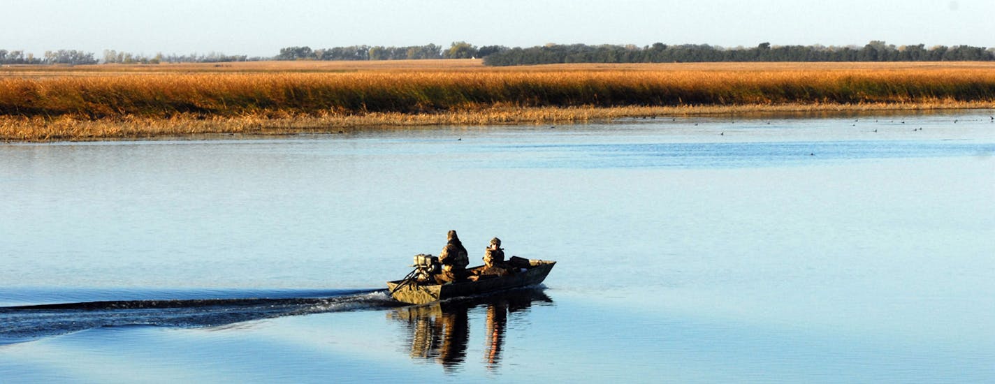 A vintage Montgomery Ward 14-foot jon boat outfitted with a mud motor bought used on the internet doubled as both a duck-hunting and fishing craft.