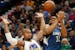 Minnesota Timberwolves center Karl-Anthony Towns (32) loses control of the ball against Golden State Warriors forward David West (3) in the first half