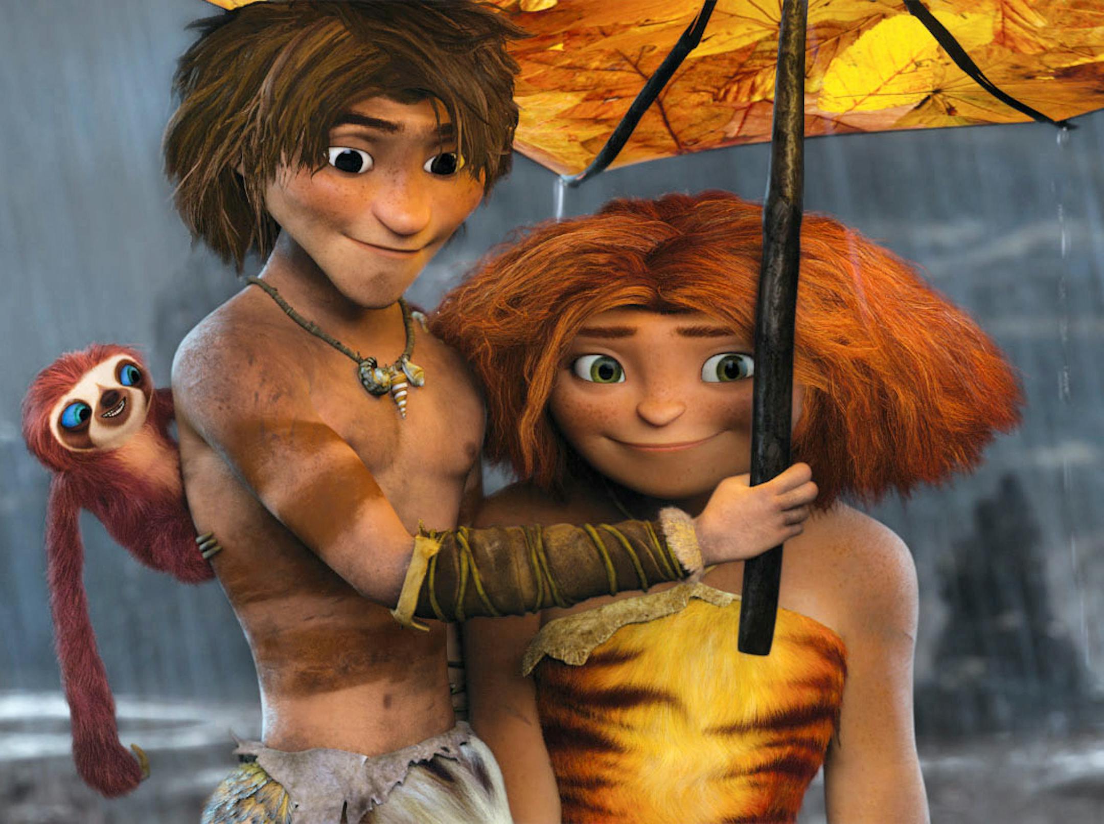 This film publicity image released by DreamWorks Animation shows, from left, Belt the sloth, voiced by Chris Sanders, Guy, voiced by Ryan Reynolds, and Eep, voiced by Emma Stone, in a scene from "The Croods." (AP Photo/DreamWorks Animation)
