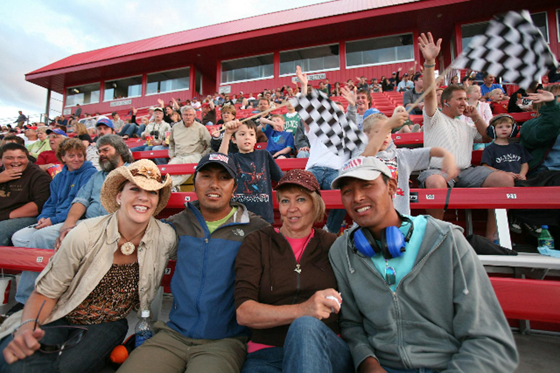 At Elko speedway, l-r Sue Kotula, Prior Lake, Mingma Ongel Sherpa, Phortse, Nepal, Irene Kotula, Prior lake, Passang Tenijing Sherpa