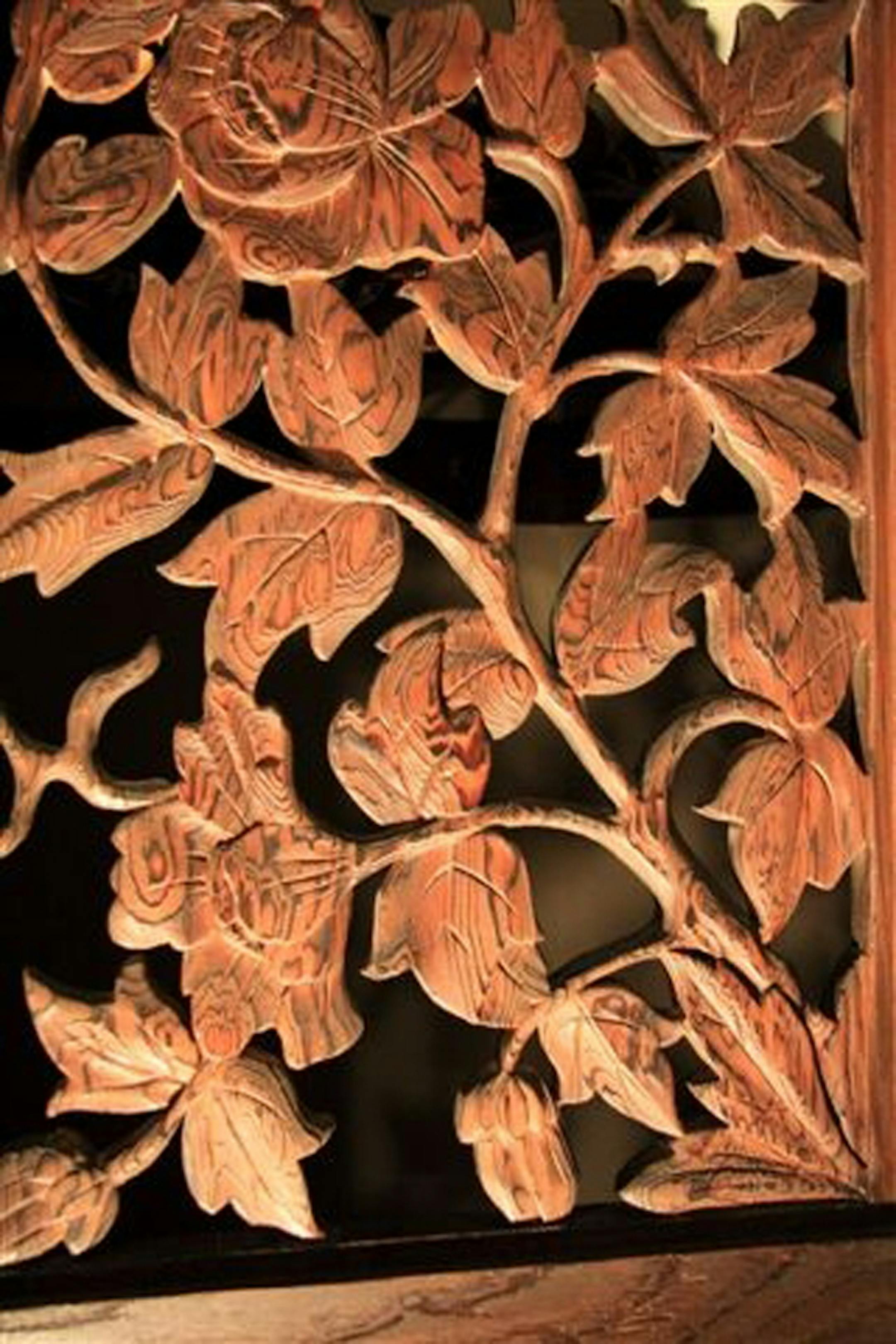 detail of jin di sugi carving from fireplace