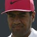 Tony Finau of the US celebrates a birdie on the 18th hole during the first round of the British Open Golf Championship in Carnoustie, Scotland, Thursd