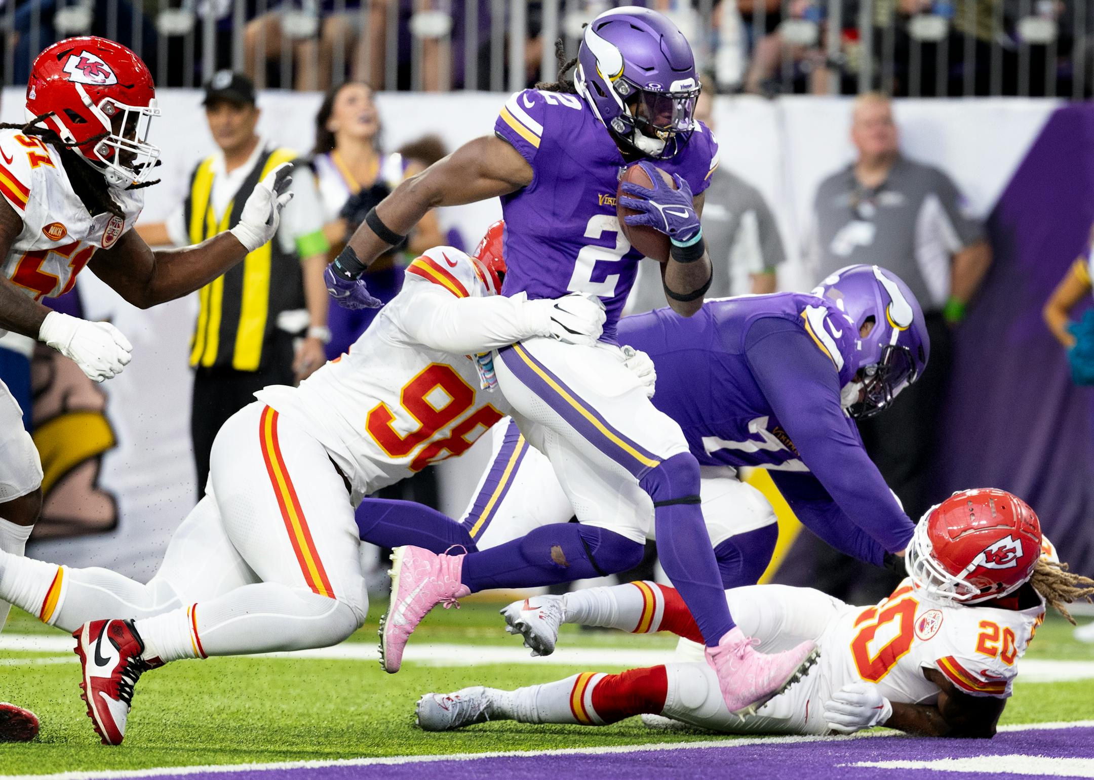 Minnesota Vikings running back Alexander Mattison (2) scores a touchdown in the fourth quarter.