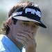 Bubba Watson reacts after missing a putt on the 10th green during the first round of the Arnold Palmer Invitational golf tournament in Orlando, Fla., 