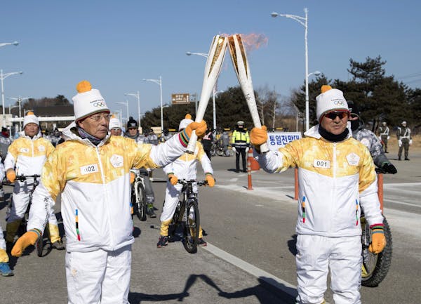 The Olympic torch relay comes to Goseong at the Gate of Inter-Korea Transit Office near the Demilitarized Zone (DMZ) in Goseong, Gangwon province, Sou