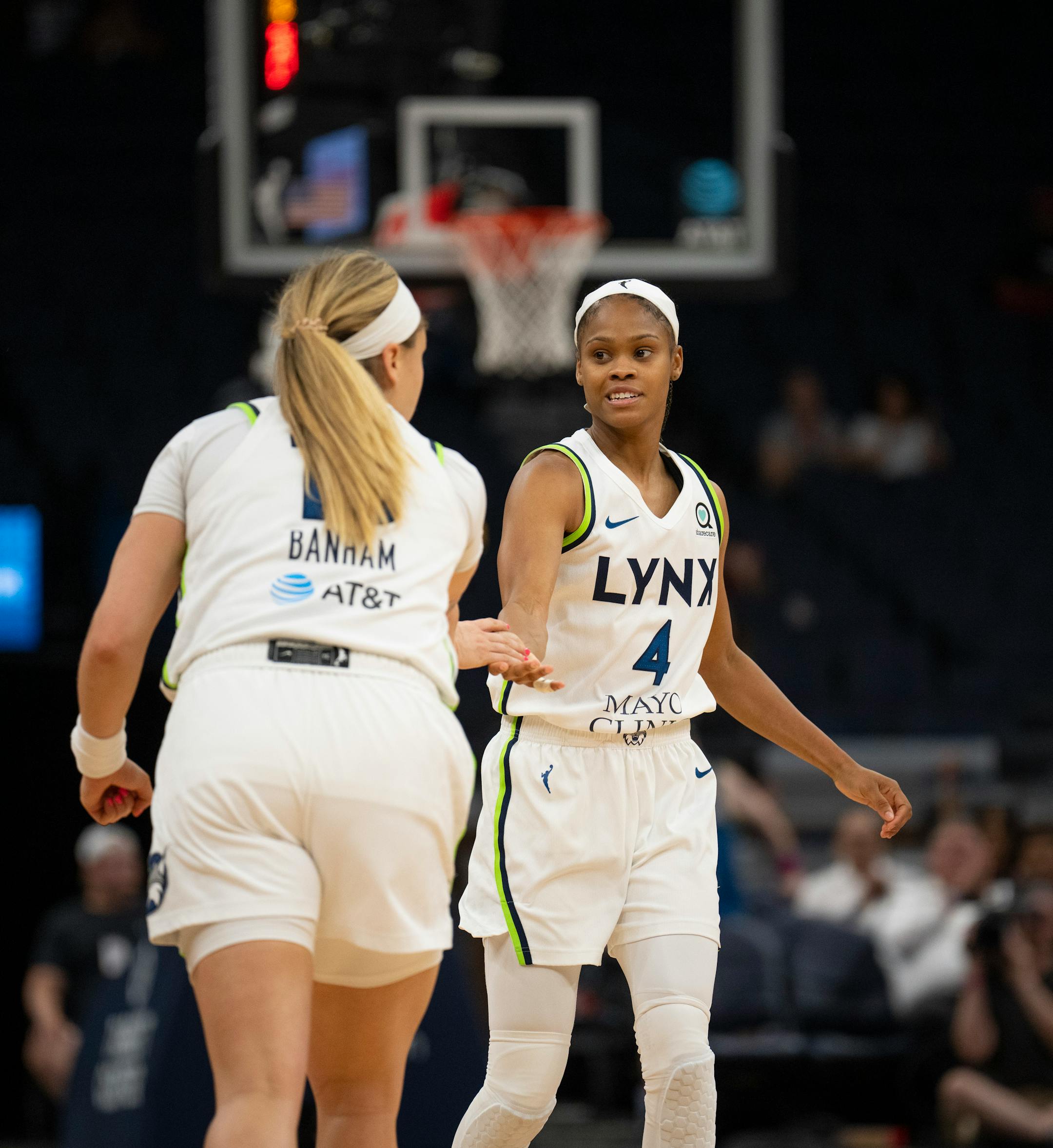 Minnesota Lynx guard Moriah Jefferson (4) was congratulated by Lynx guard Rachel Banham (15) after hitting a second quarter three pointer.