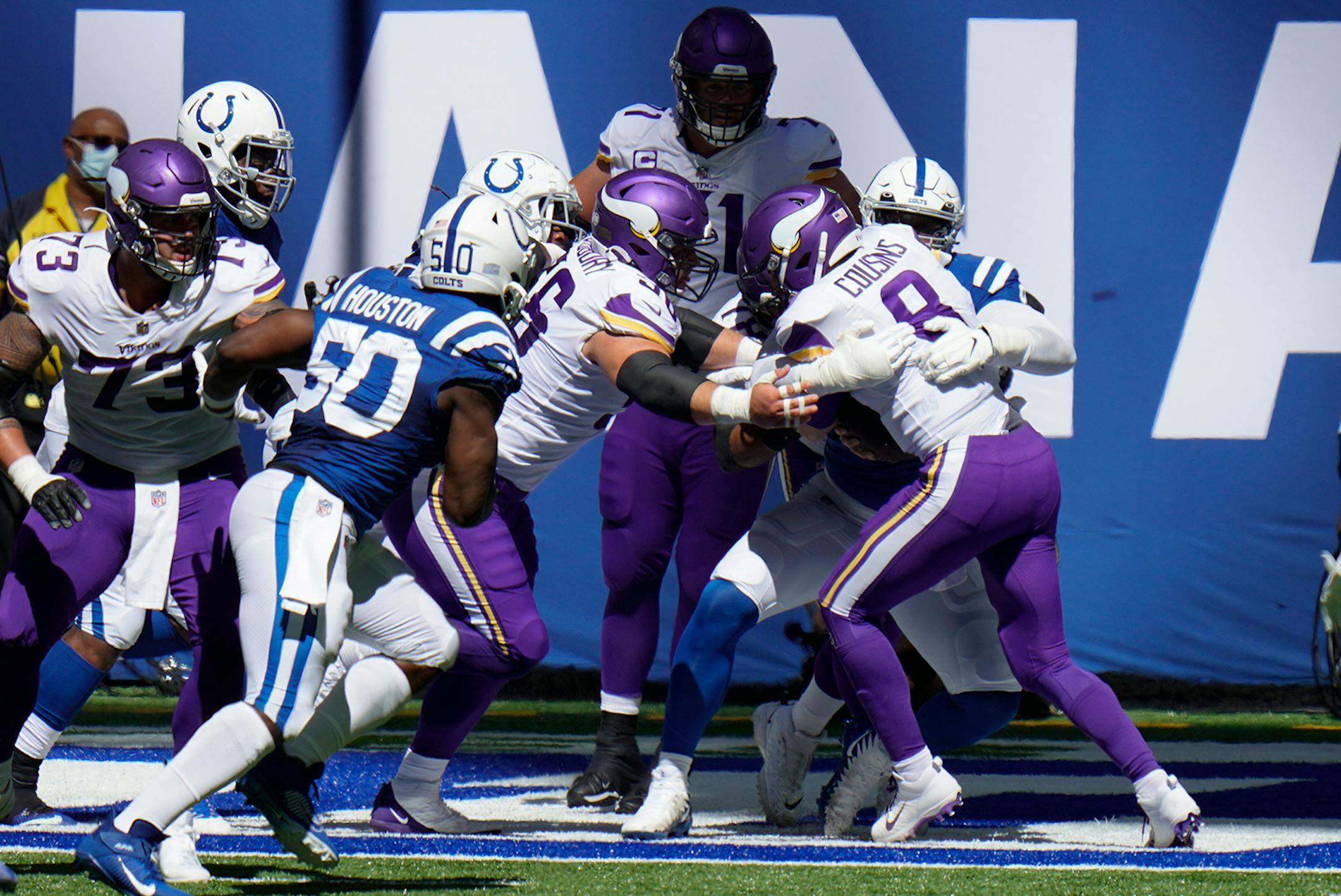 Minnesota Vikings quarterback Kirk Cousins (8) is sacked by Indianapolis Colts' DeForest Buckner (99) for a safety during the first half of an NFL football game, Sunday, Sept. 20, 2020, in Indianapolis.