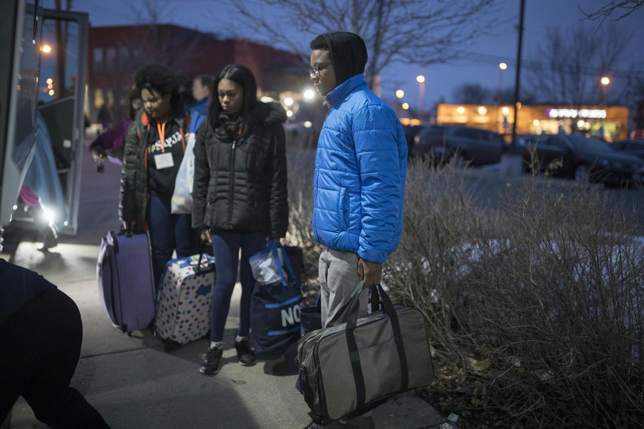 Timothy Brown gathered with other at the Northside Achievement Zone and boarded a bus for Washington D.C Wednesday March 21, 2018 in Minneapolis, MN.