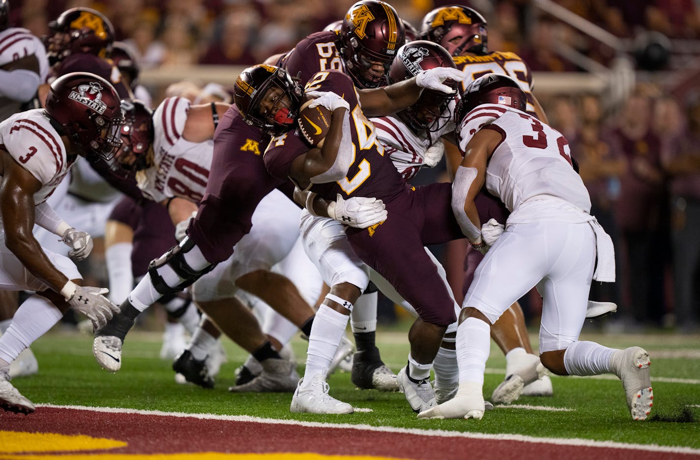 Minnesota Golden Gophers running back Mohamed Ibrahim (24) scored from the four yard line for a first quarter touchdown at Huntington Bank Stadium in Minneapolis Thursday night, September 1, 2022. The University of Minnesota Gophers faced the New Mexico State Aggies in the opening football game of the season. ] JEFF WHEELER • Jeff.Wheeler@startribune.com