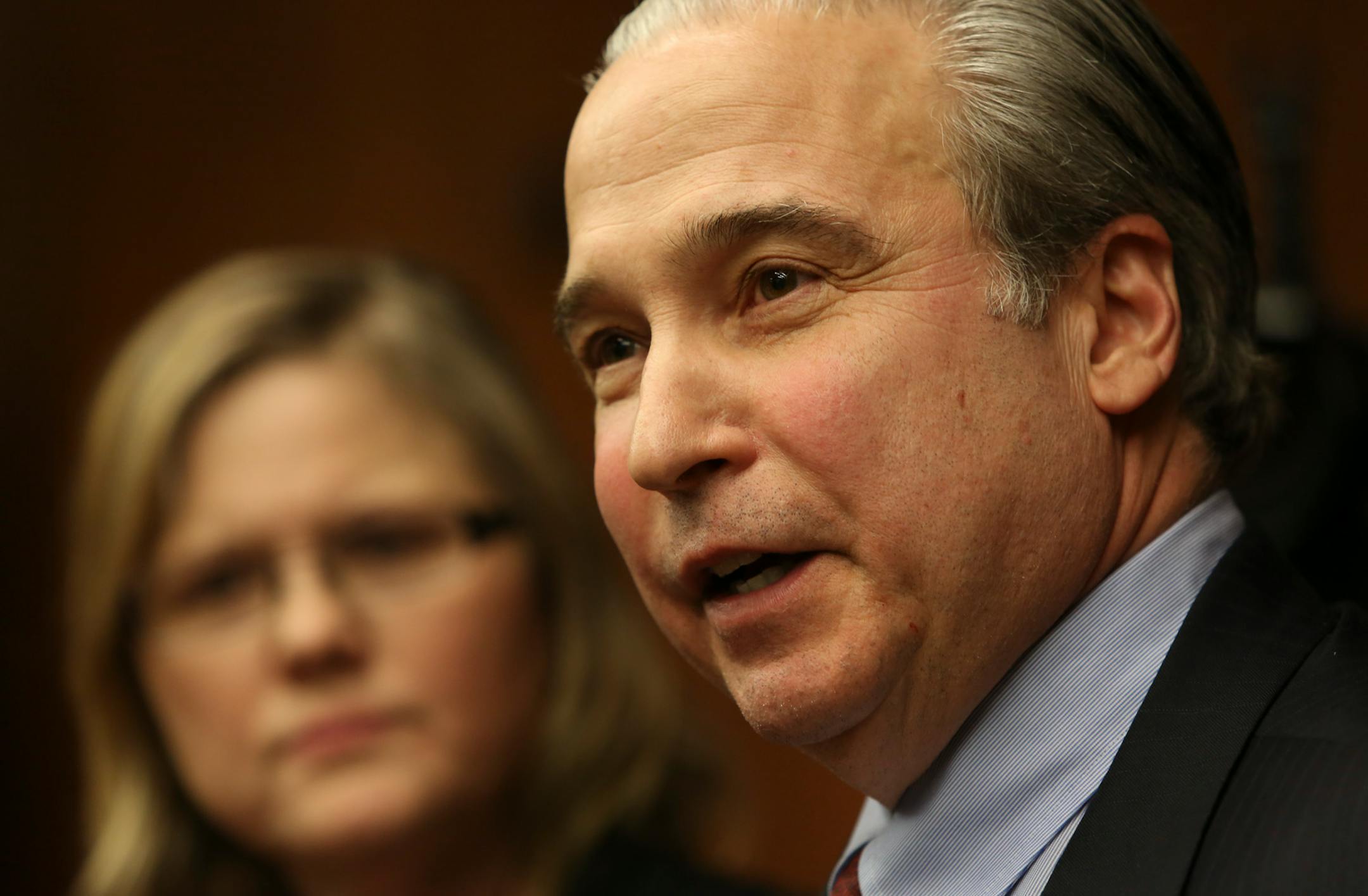 DFL Rep. Michael Paymar talked to the press after the House Public Safety committee meeting adjourned at the State Office Building in St. Paul, Min., Wednesday, March 19, 2013.