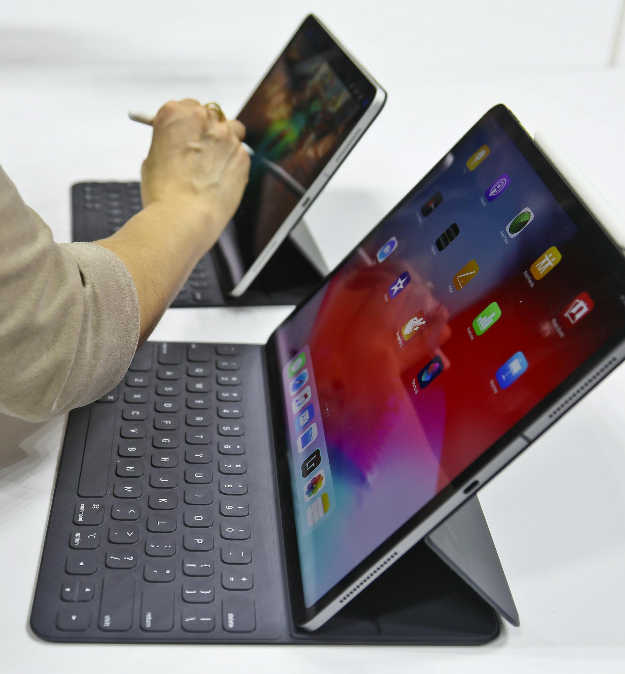 An iPad Pro is reviewed after an event announcing new products Tuesday Oct. 30, 2018, in the Brooklyn borough of New York. (AP Photo/Bebeto Matthews)