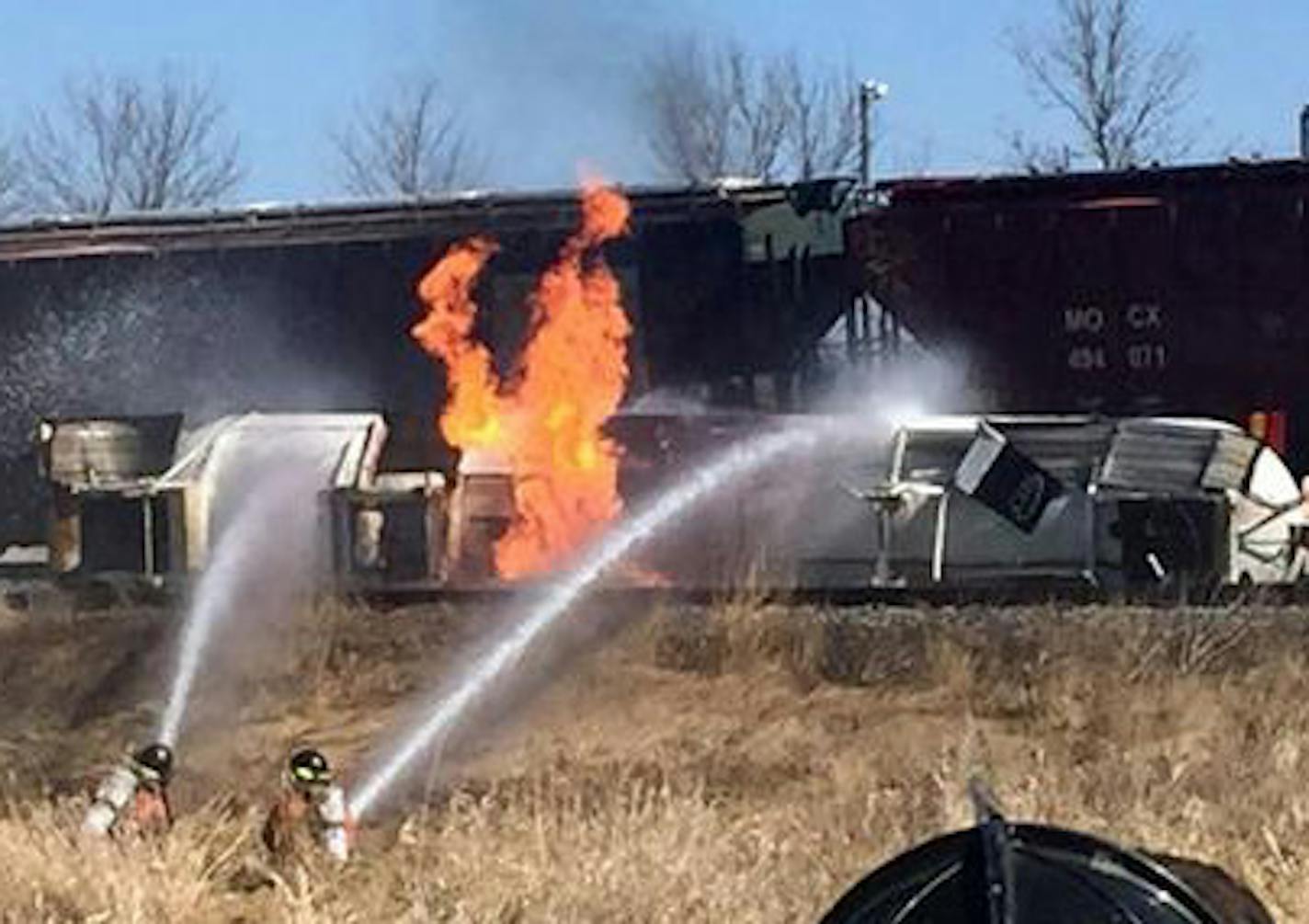 Firefighters at a train derailment in Callaway, Minn.