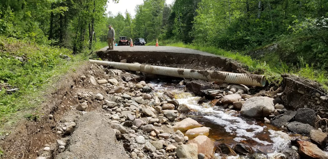 Campers at Camp du Nord near Ely, Minn., faced washed-out roads and trails before county crews repaired them, allowing them to leave.