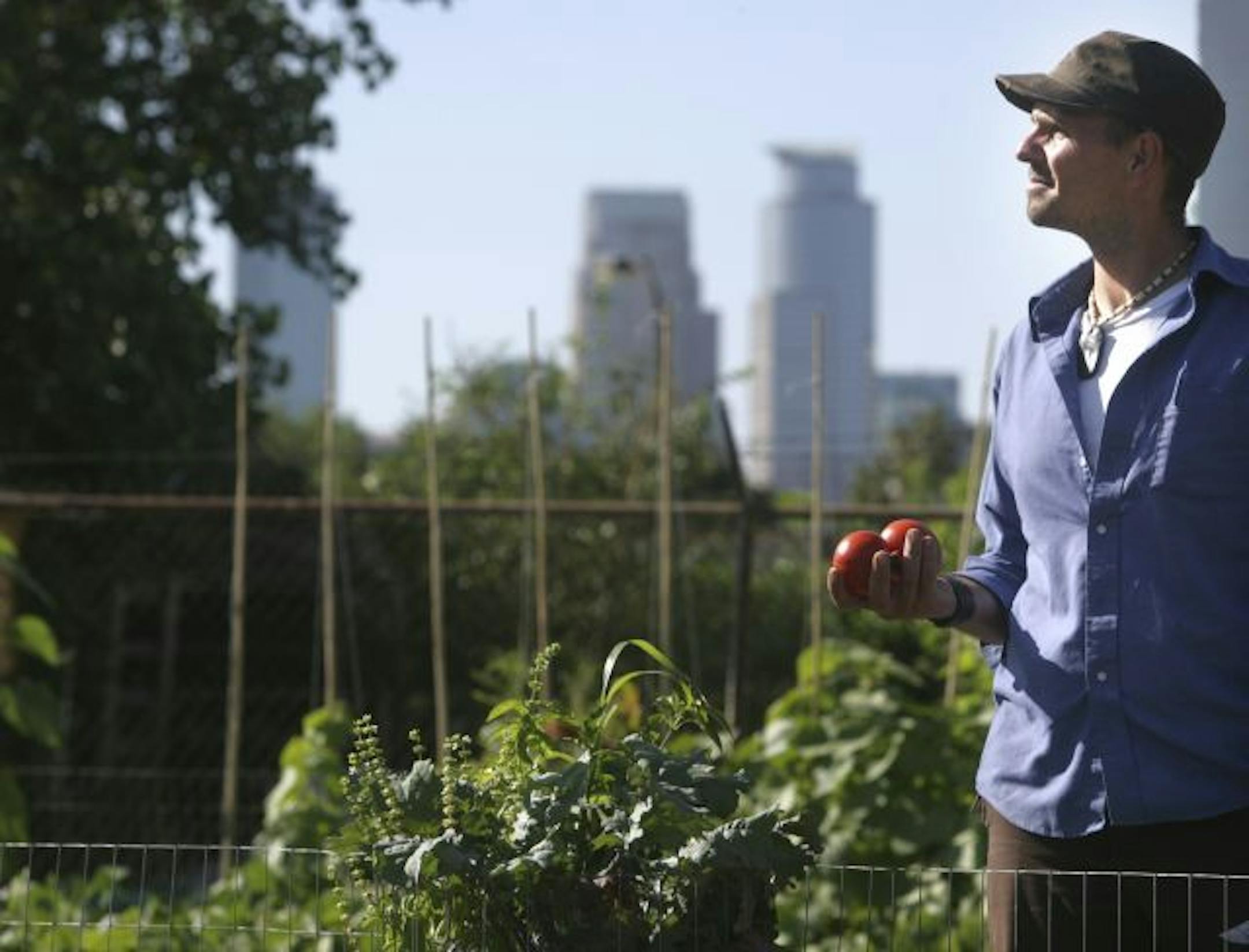 Stefan Meyer operates Growing Lots Urban Farm in the Seward neighborhood of Minneapolis, where a small farm was created on top of a parking lot.