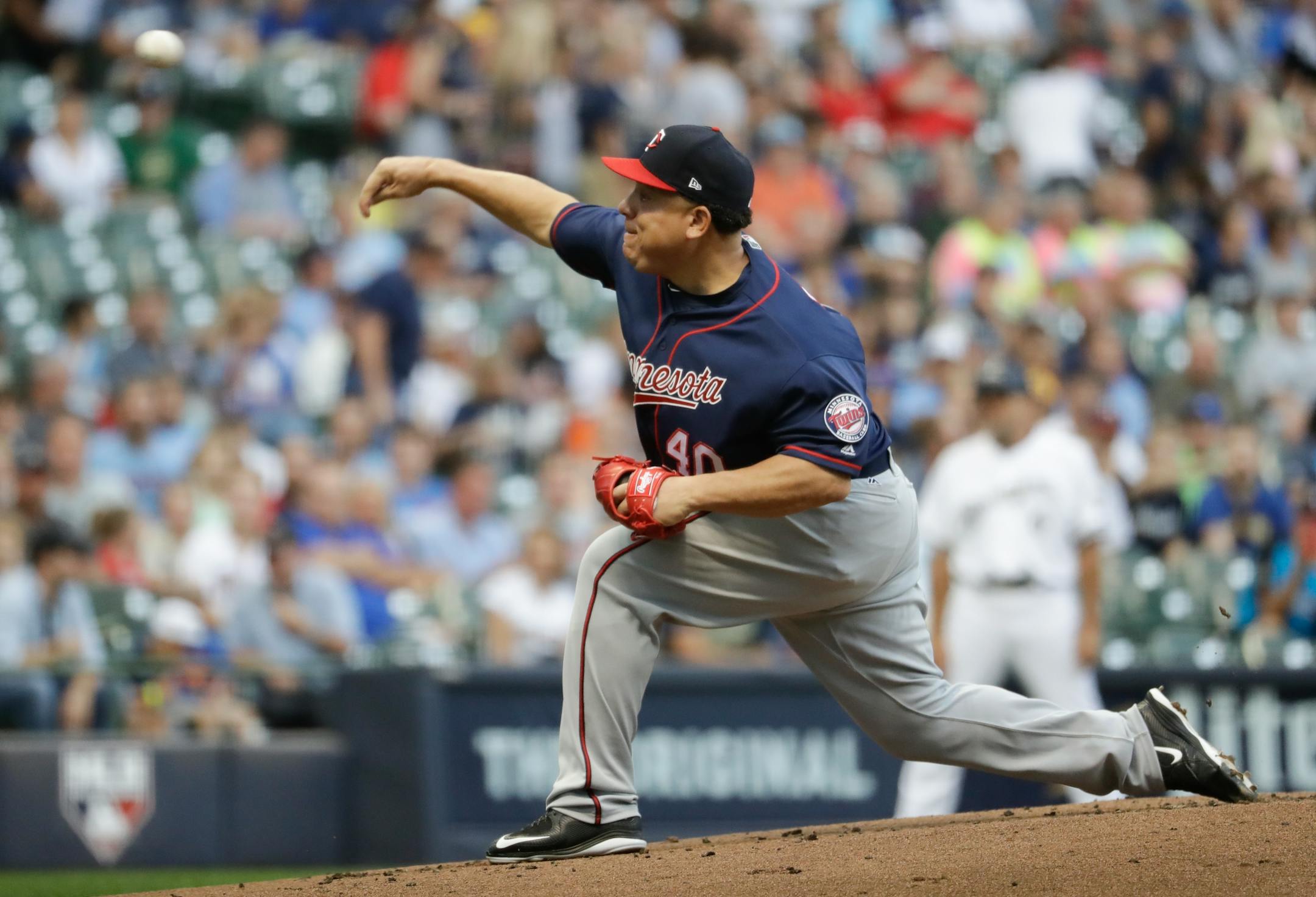 Minnesota Twins starting pitcher Bartolo Colon throws during the first inning of a baseball game Wednesday, Aug. 9, 2017, in Milwaukee. (AP Photo/Morry Gash)