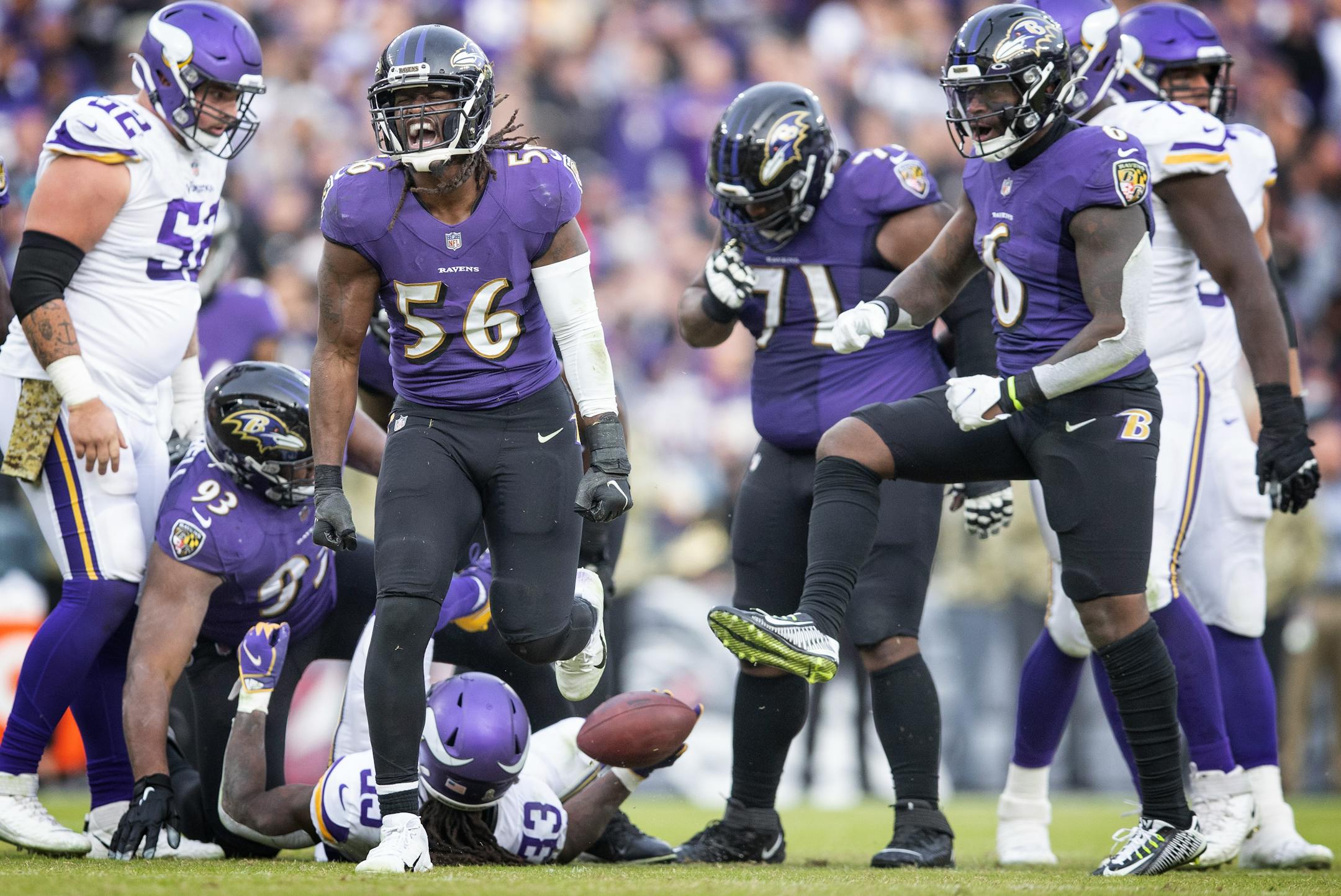 Baltimore Ravens middle linebacker Josh Bynes (56), celebrates after the defense stops Minnesota Vikings running back Dalvin Cook (33), for no gain in the fourth quarter.