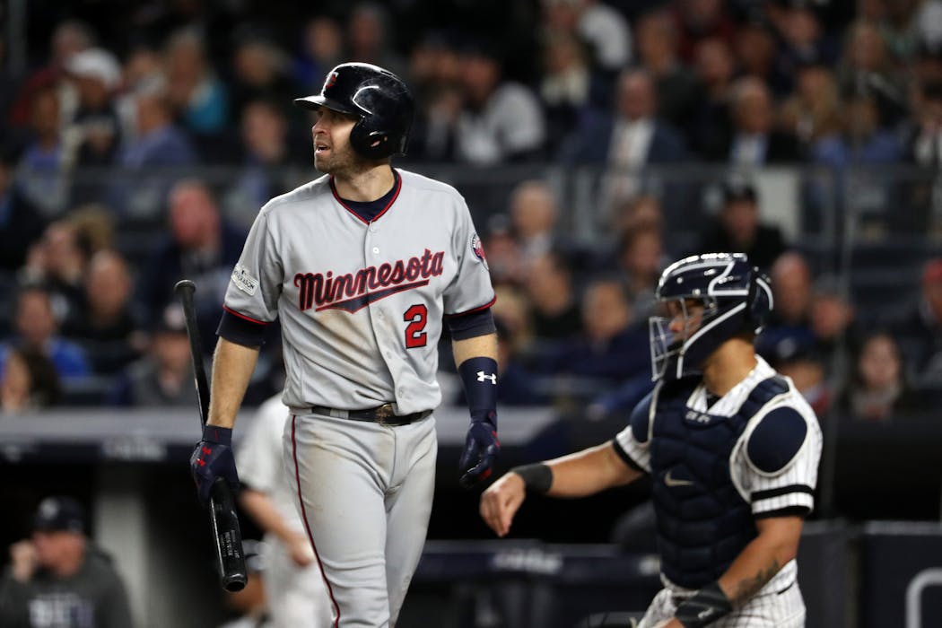 Twins second baseman Brian Dozier reacted after a strikeout in the sixth inning of the 2017 wild-card game in New York.