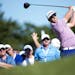 Hunter Mahan, of the United States, tees off on the 17th hole during second round at the Canadian Open golf tournament in Oakville, Ontario, Friday, J